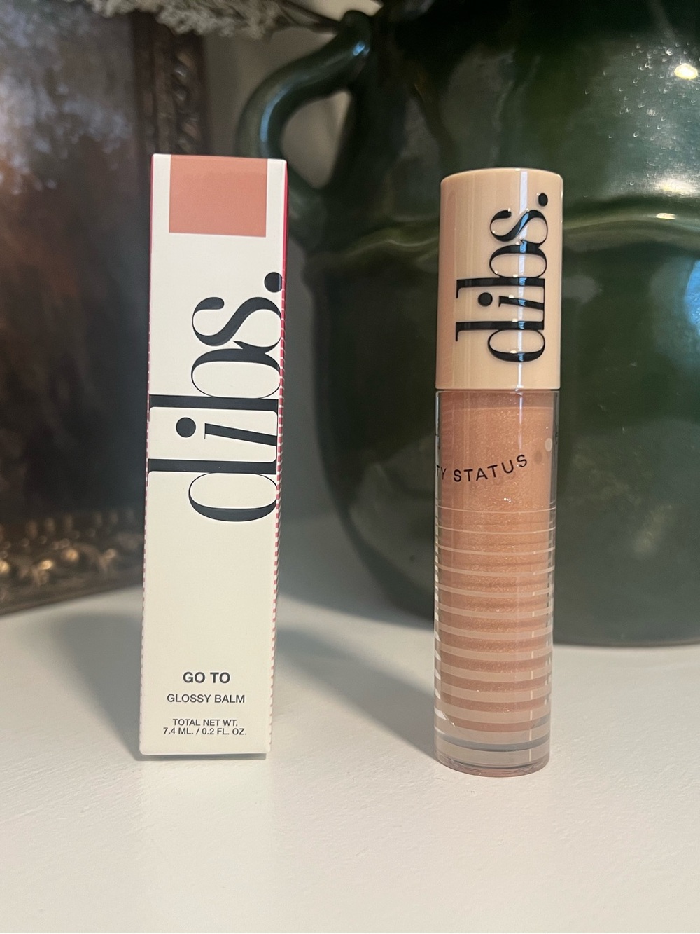 Dibs Go To Glossy Balm in KISS me quick. #147.